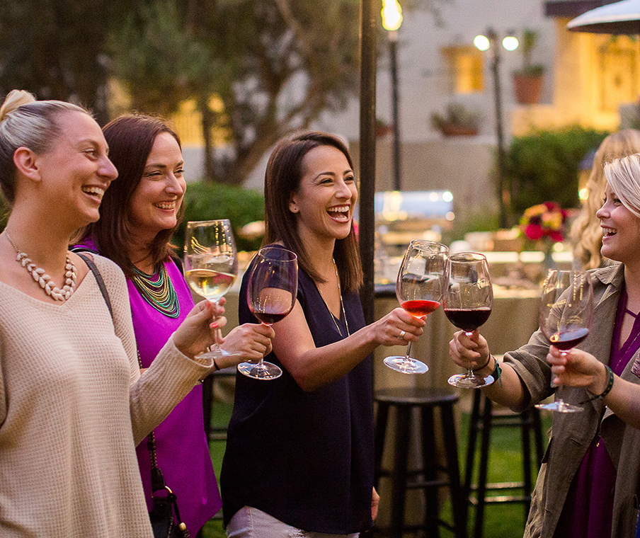 women drinking wine
