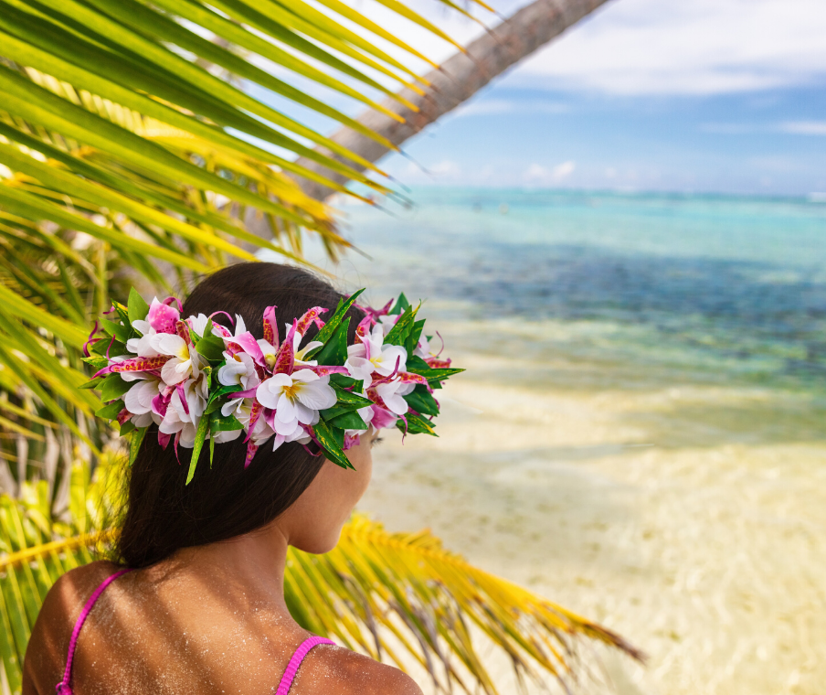 Girl on the Beach wearing Hawaiian floral crown