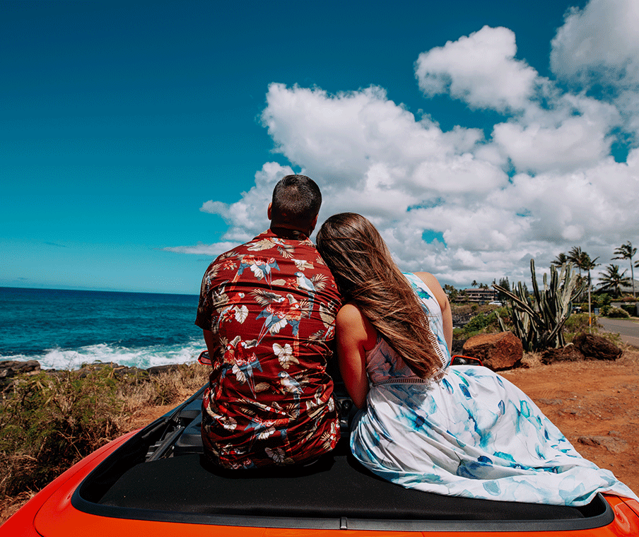 Couple walking on Poipu beach