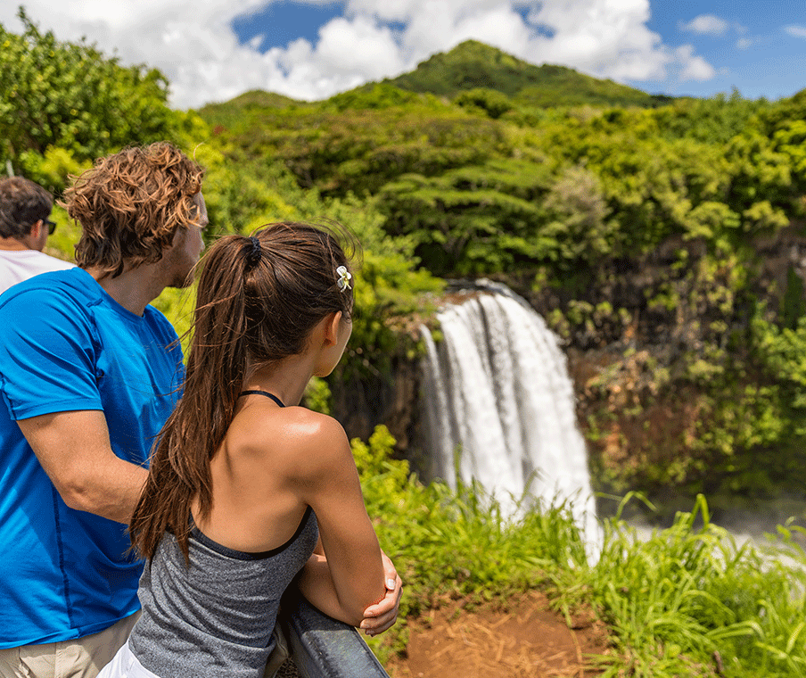 Couple Watching Waterfalls Kauai