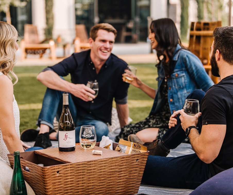 friends drinking wine at The Village