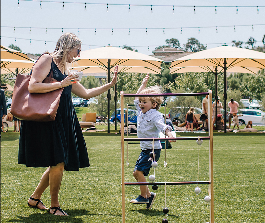 mother and son high-fiving