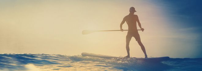 Mobile: Man Paddleboarding On Ocean